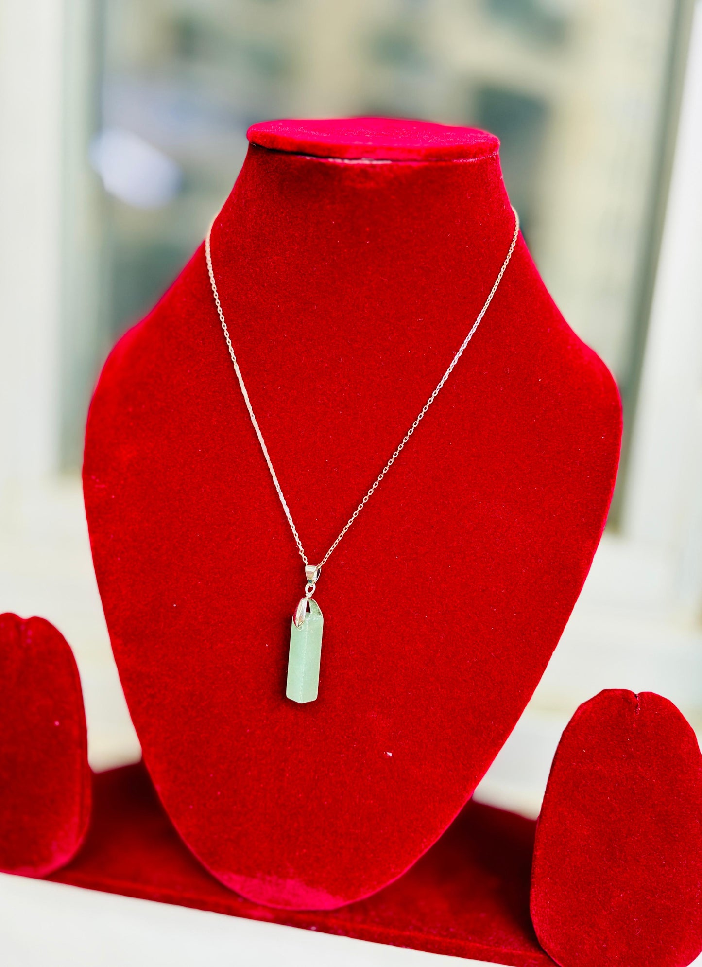 Green Aventurine Pendant for prosperity and well-being.
