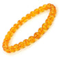 Citrine bracelet with round beads known for uplifting energy and attracting prosperity.