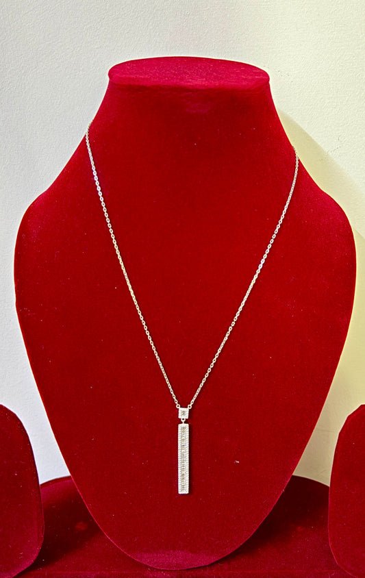 Elevara 11 Silver Pendant on red display stand for astrology enthusiasts.