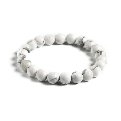 Howlite bracelet promoting calmness and emotional healing with white beads.