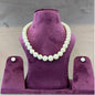 Diana Pearl Set on display featuring elegant pearls and astrology-inspired design.
