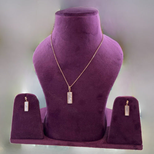 Moon’s Embrace Silver Set with Pearl Pendant and Necklace on Purple Display