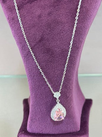Rosaria Bloom Silver Pendant on a display stand, showcasing intricate design and elegant style.