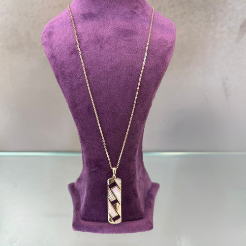 Nova Amour Silver Pendant with astrology stones on a necklace stand.