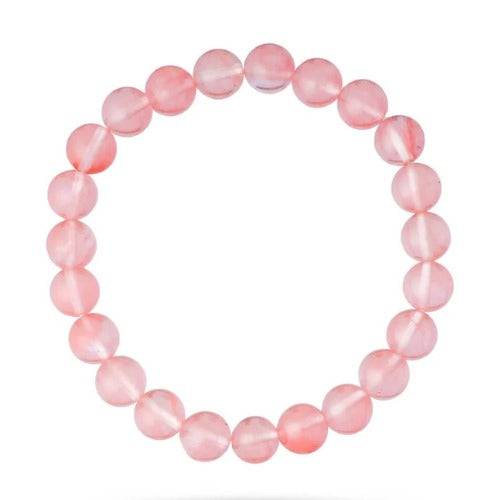 Rose Quartz Bracelet with round pink beads promoting love and emotional healing.