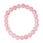 Rose Quartz Bracelet with round pink beads promoting love and emotional healing.